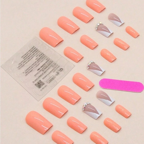 Elegant Peach/Coral colored Nails with Rhinestone Accents - Picture 2 of 2